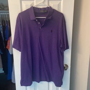 Purple men’s polo golf shirt with black emblem